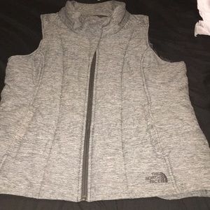 Grey north face vest, size XL but fits LARGE